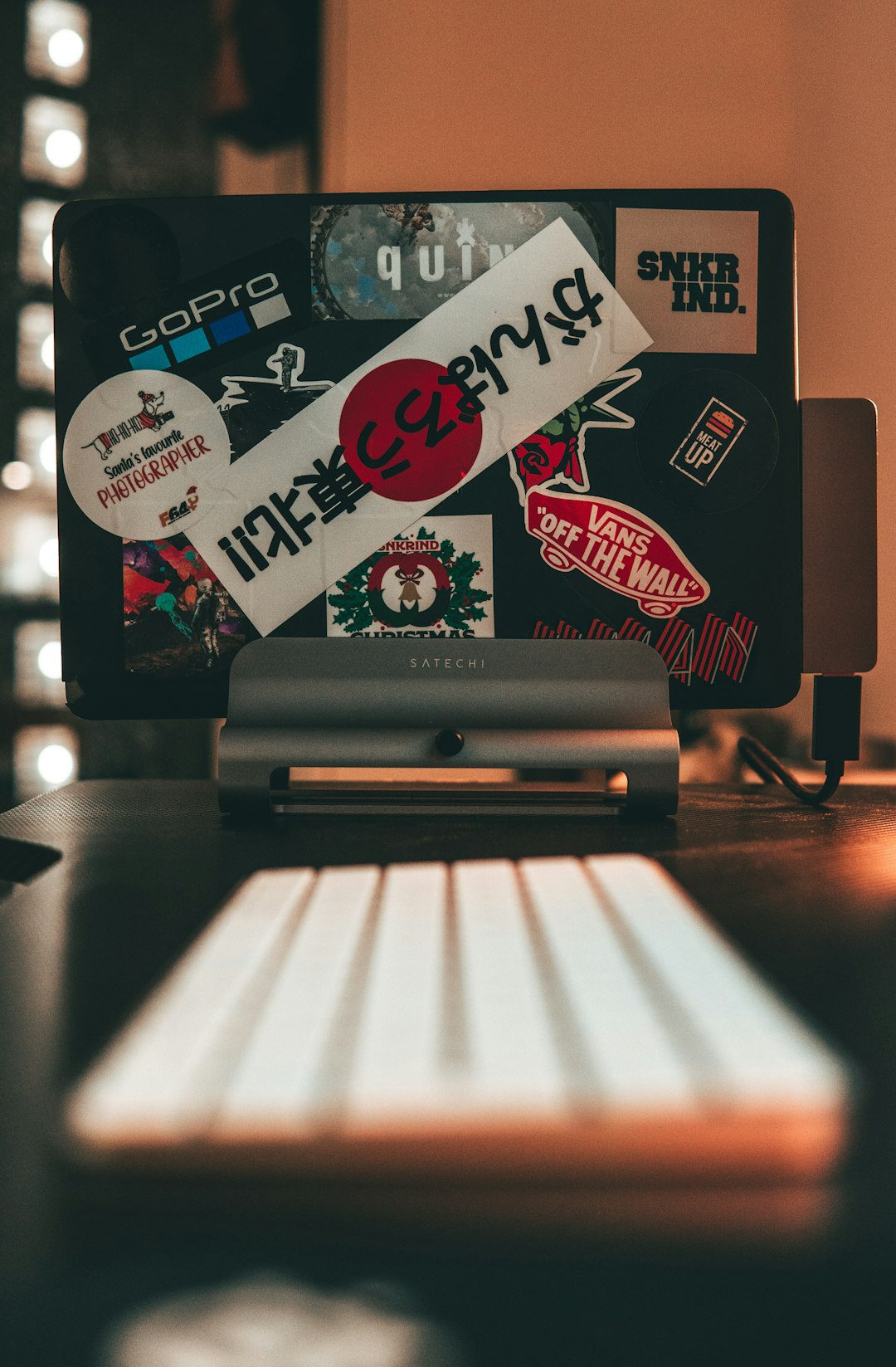 a laptop computer sitting on top of a wooden desk agency team, client websites, maintenance workflow, support tickets