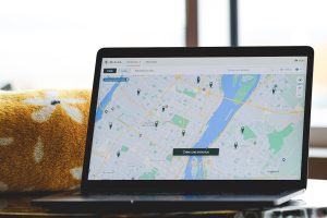 a laptop with a map on the screen website migration, search rankings, redirect map