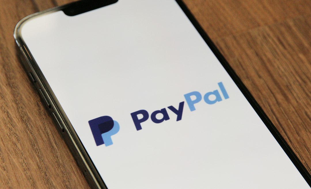 a phone with a pay pay logo on it paypal dashboard, order tracking, ecommerce shipment