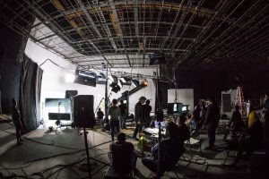 band playing on stage during daytime video production, filmmaker, online portfolio