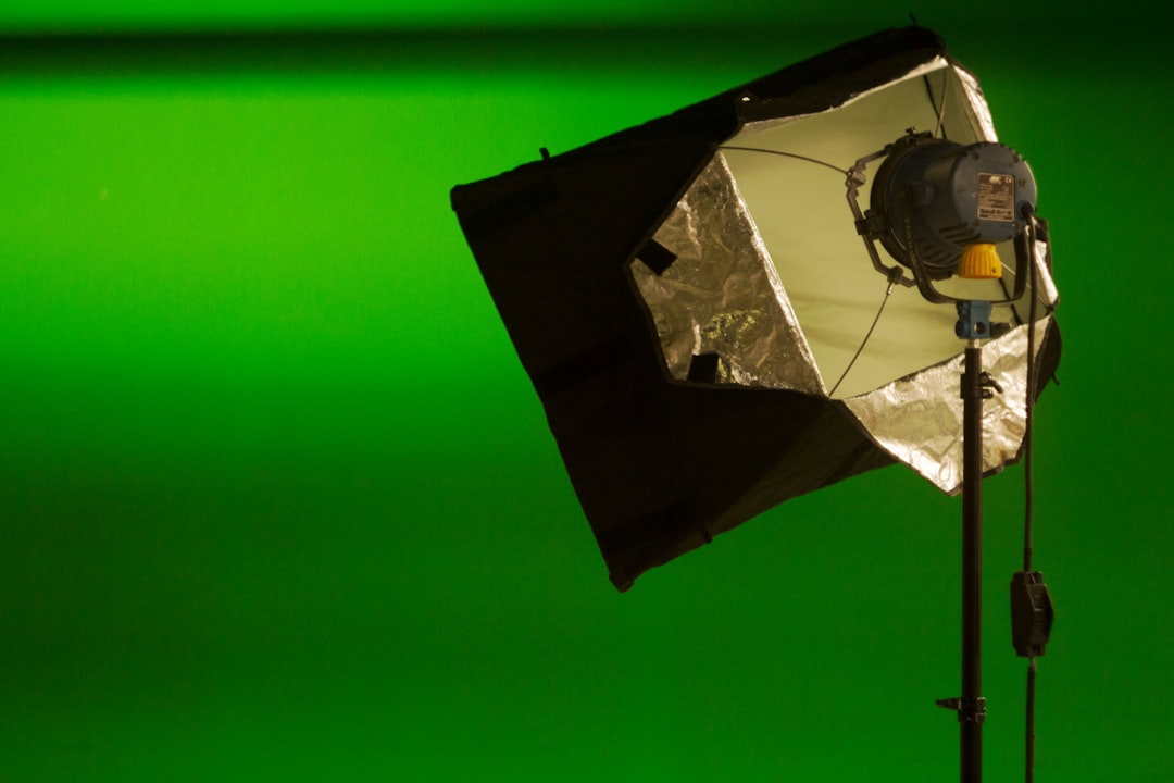 black and gray studio light three point lighting, green backdrop, studio lights