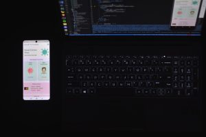 black and silver laptop computer mobile app builder, flutter interface, app development workflow