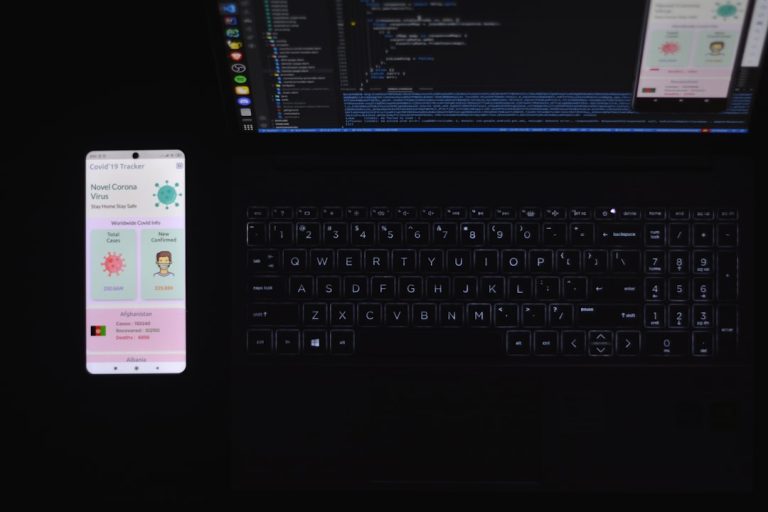 black and silver laptop computer mobile app builder, flutter interface, app development workflow