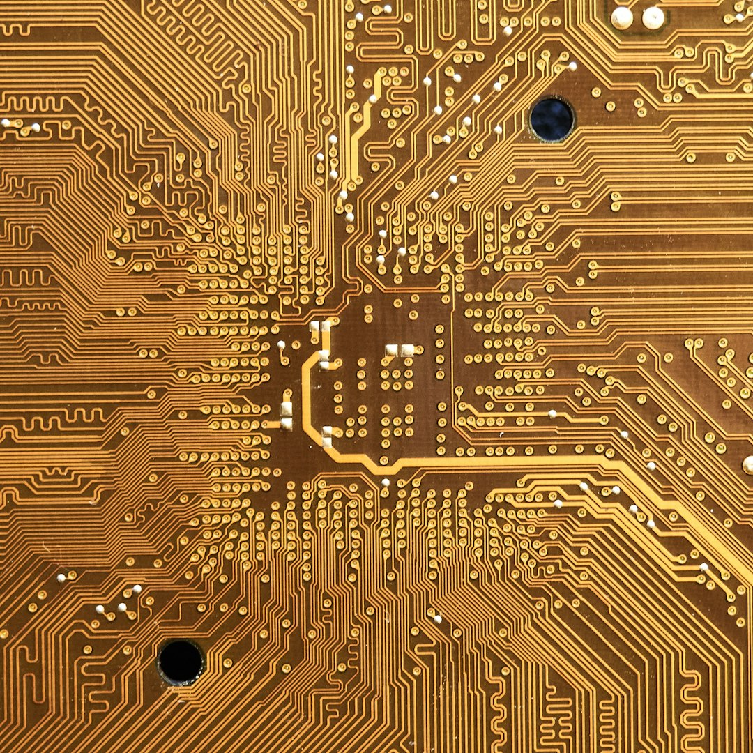 brown and black abstract painting flash memory chip, microprocessor, digital electronics