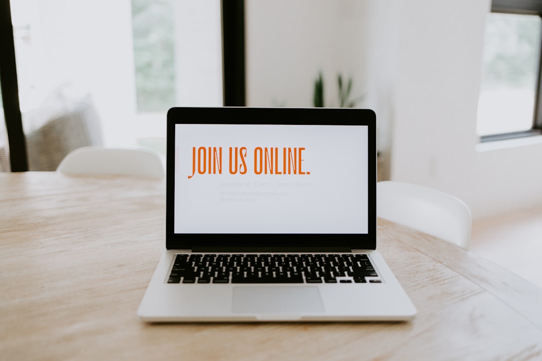 macbook pro on brown wooden table online course laptop learning