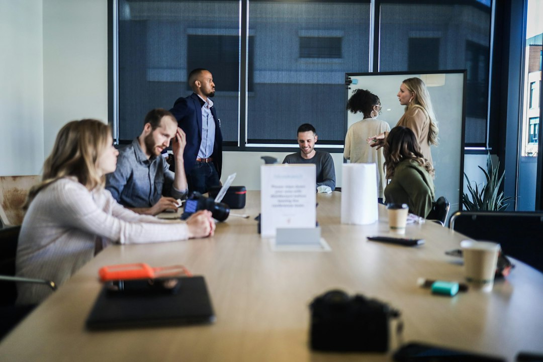 people sitting at the table sales meeting, buyer pain, value chart