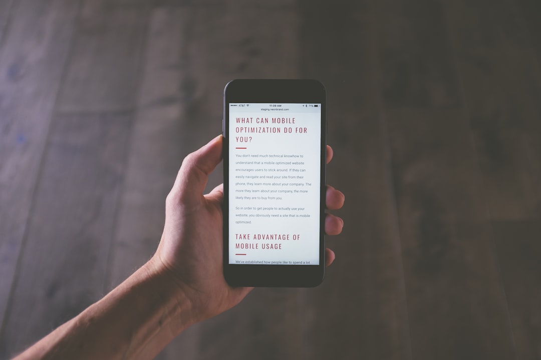 person holding space gray iPhone mobile form, simple fields, easy signup