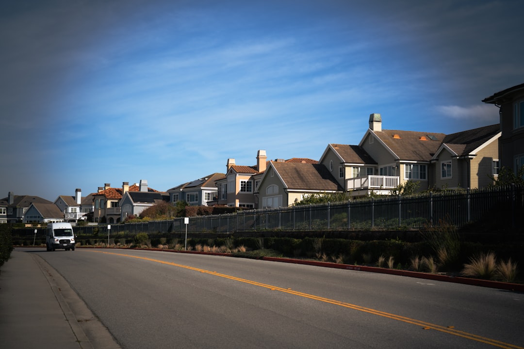 Suburban street with houses and a van. local neighborhood, home repair, service van, happy customer