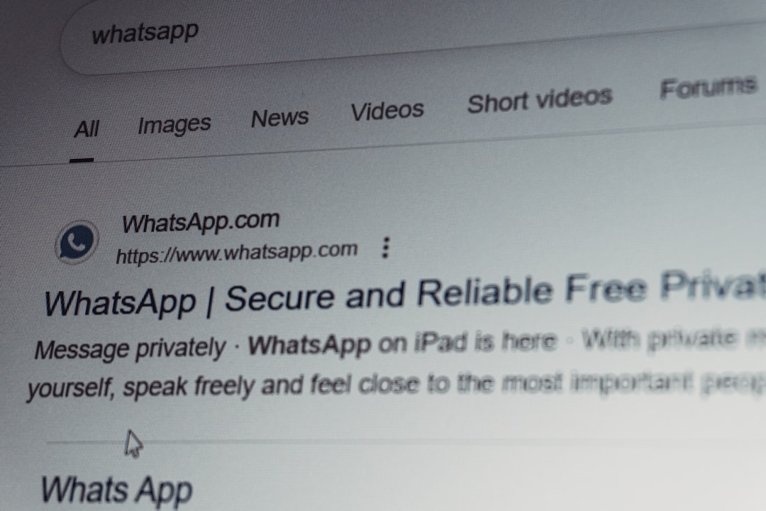 Whatsapp search results on a computer screen. email security, external contact, warning popup