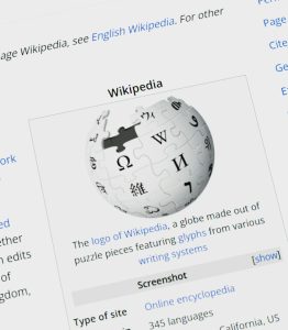 Wikipedia logo globe with text on screen website migration, search rankings, redirect map
