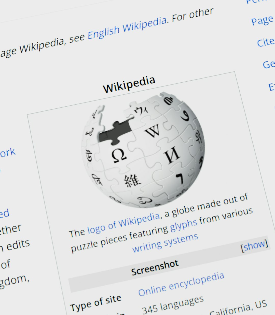 Wikipedia logo globe with text on screen website migration, search rankings, redirect map