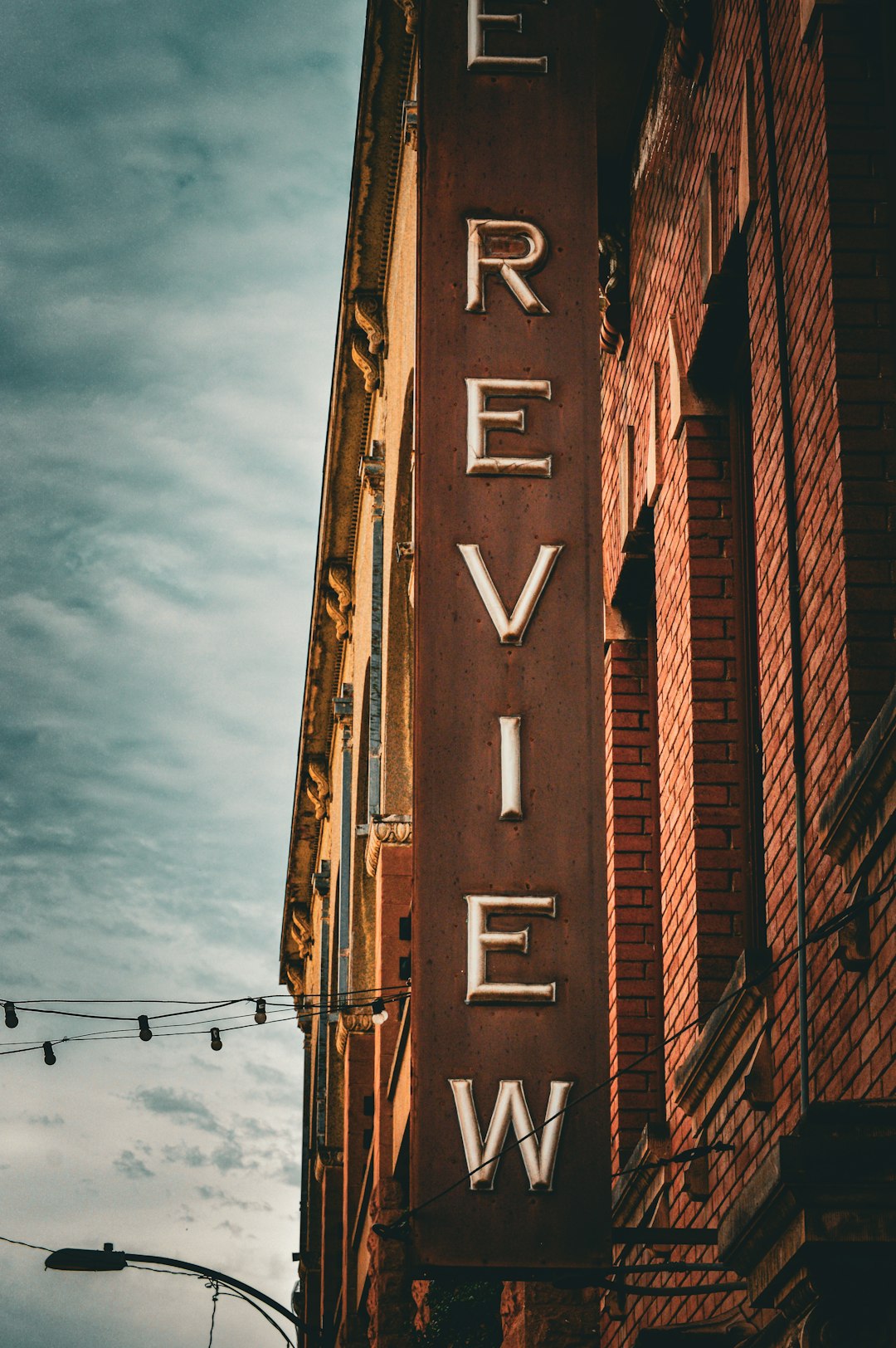 a brick building with a large sign on the side of it customer reviews, star ratings, feedback response
