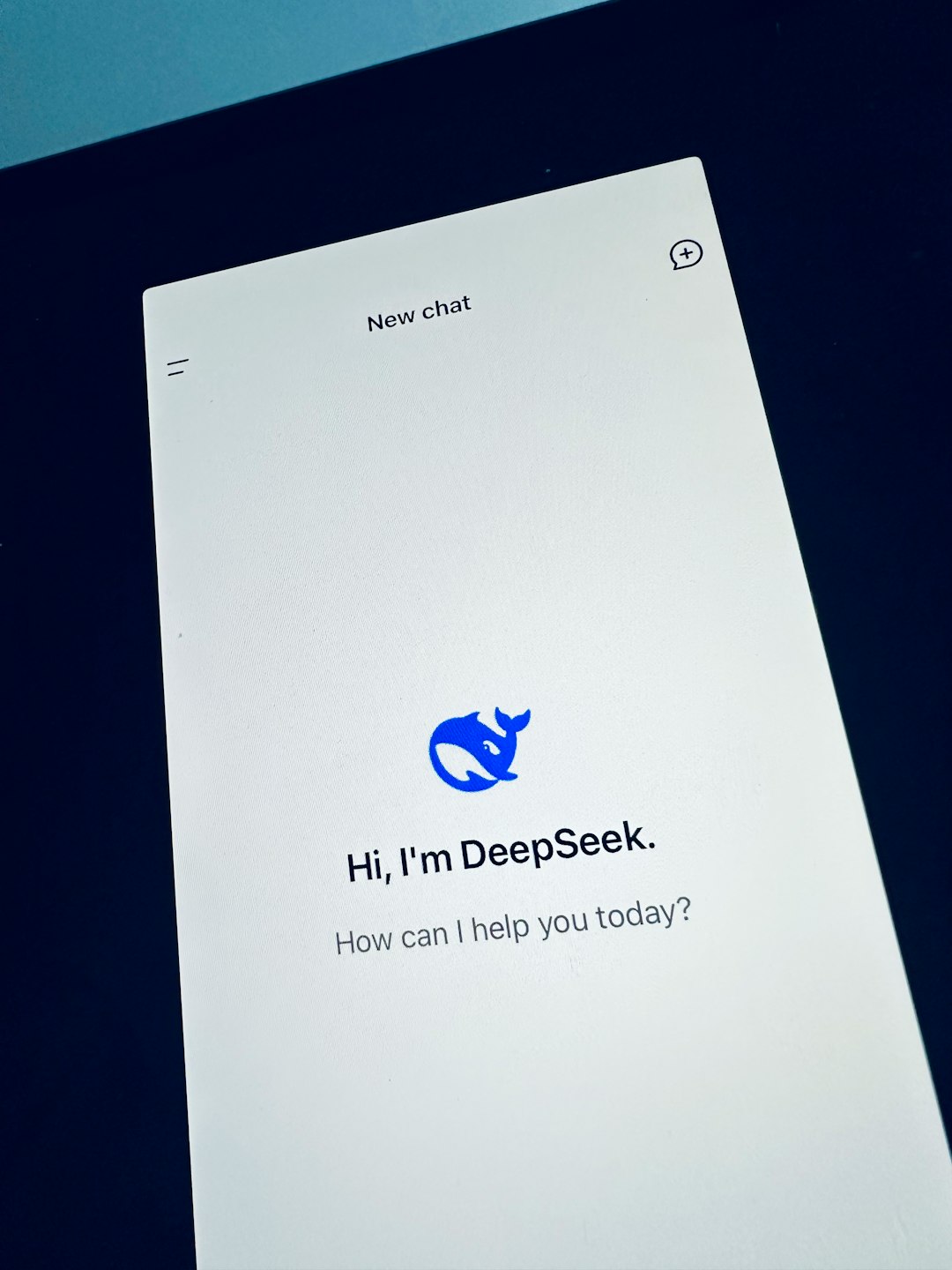 A cell phone with a text message on the screen help desk dashboard, ai chatbot, support analytics