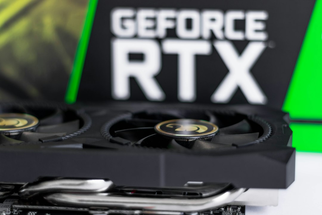 a close up of a graphics card on a table linux battery, nvidia graphics, performance monitor