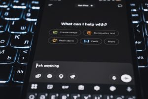 A smartphone is showing an ai assistant's interface. help desk dashboard, ai chatbot, support analytics