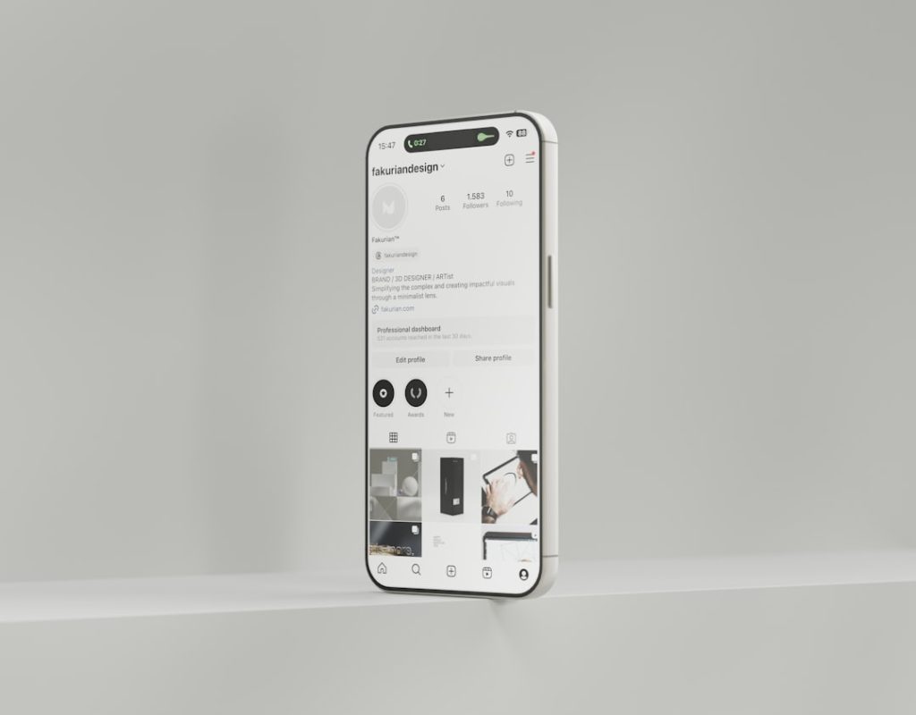 a white cell phone is hanging on a wall email editor, gif upload, mobile preview