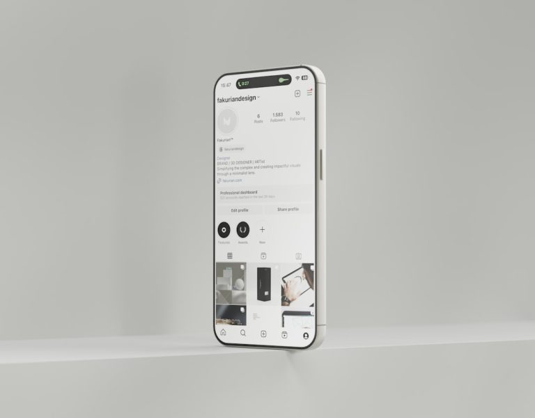 a white cell phone is hanging on a wall email editor, gif upload, mobile preview