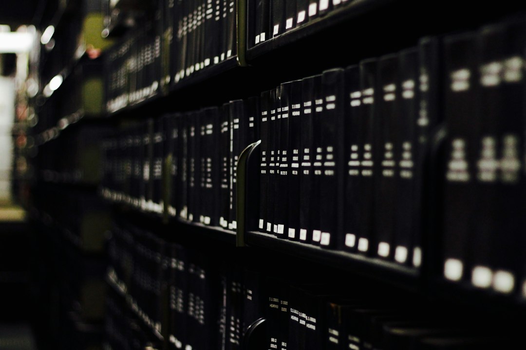 black hardbound books on shelves case files, legal analytics, workflow automation, litigation