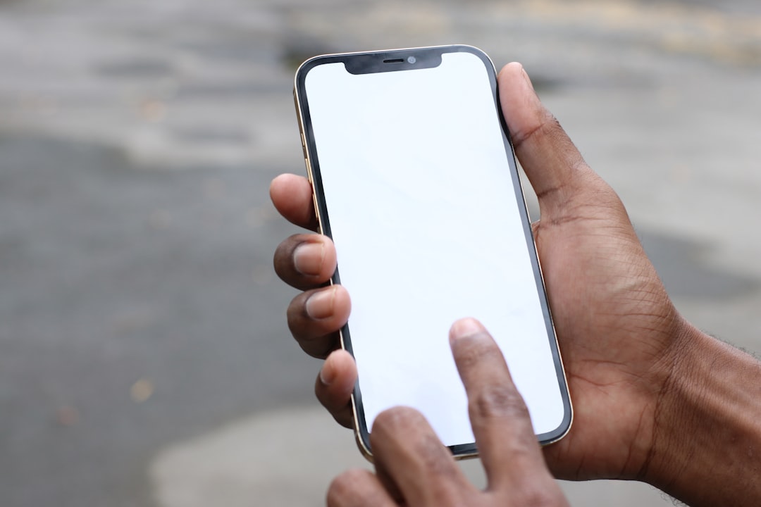 person holding silver iphone 6 with black case iphone print preview, pinch gesture, pdf save