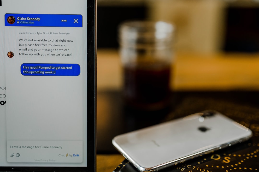 silver iPhone X on brown surface employee support chatbot, password reset, automated ticketing