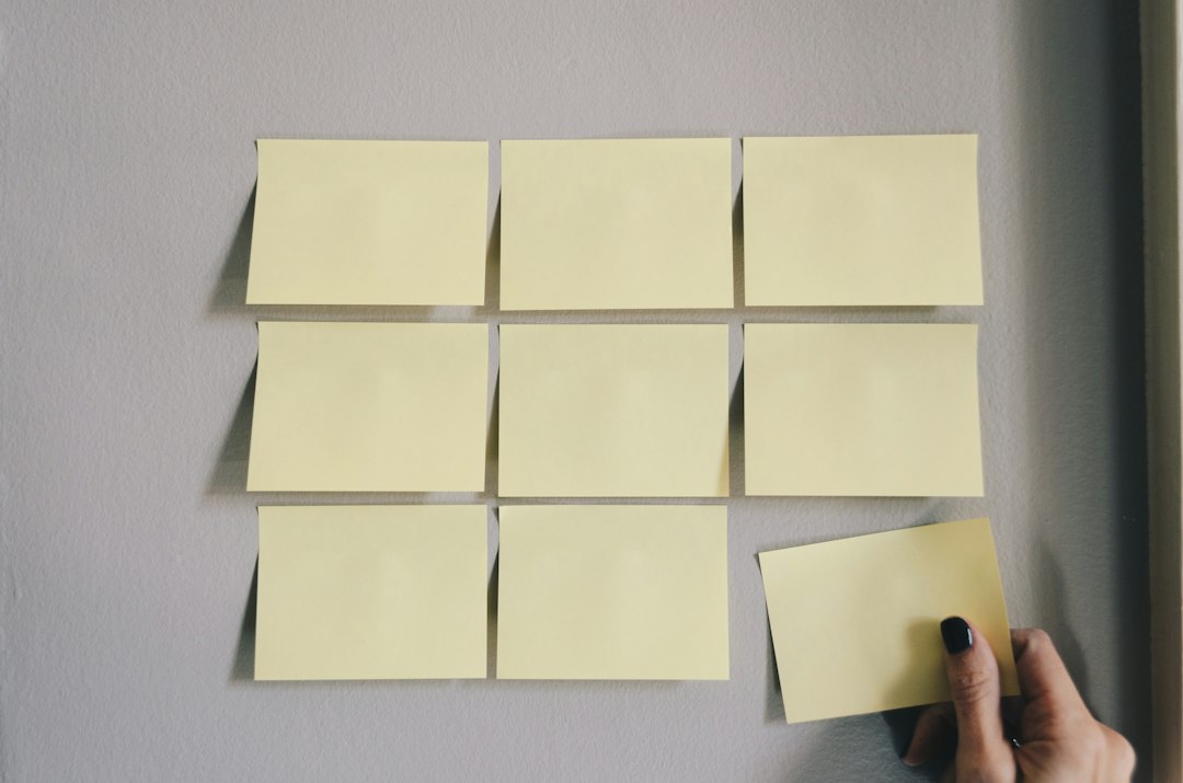 six white sticky notes priority board, sticky notes, project planning, team meeting