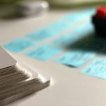 a close-up of a calculator note cards, linked ideas, mobile research, digital notes