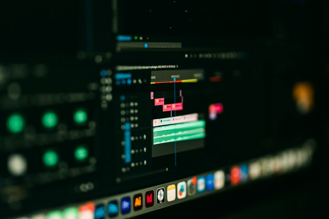 a close up of a computer screen with a blurry background audio editor, volume levels, quality check