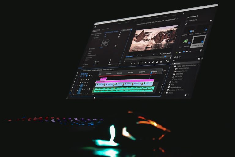 A computer monitor displaying video editing software with a timeline and preview window imovie export screen, video resolution, iphone editing