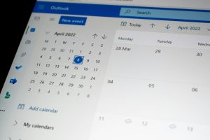 a computer screen with a calendar on it digital assistant dashboard, calendar tasks, email automation