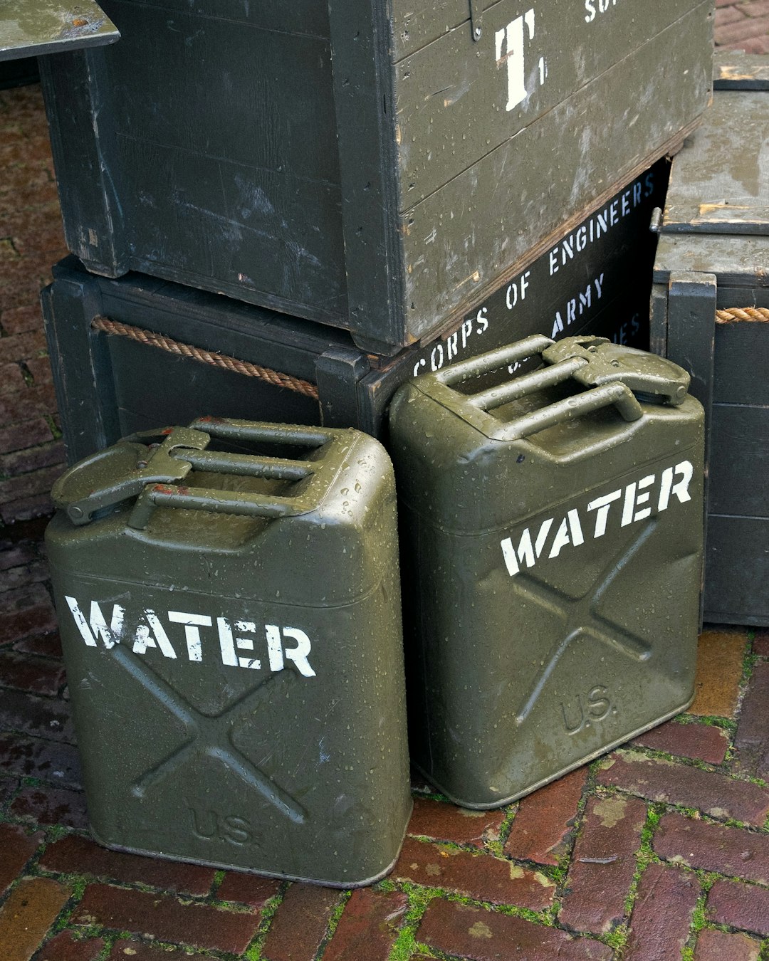 a couple of green containers sitting on top of a brick floor us imperial units, measuring jugs, volume comparison