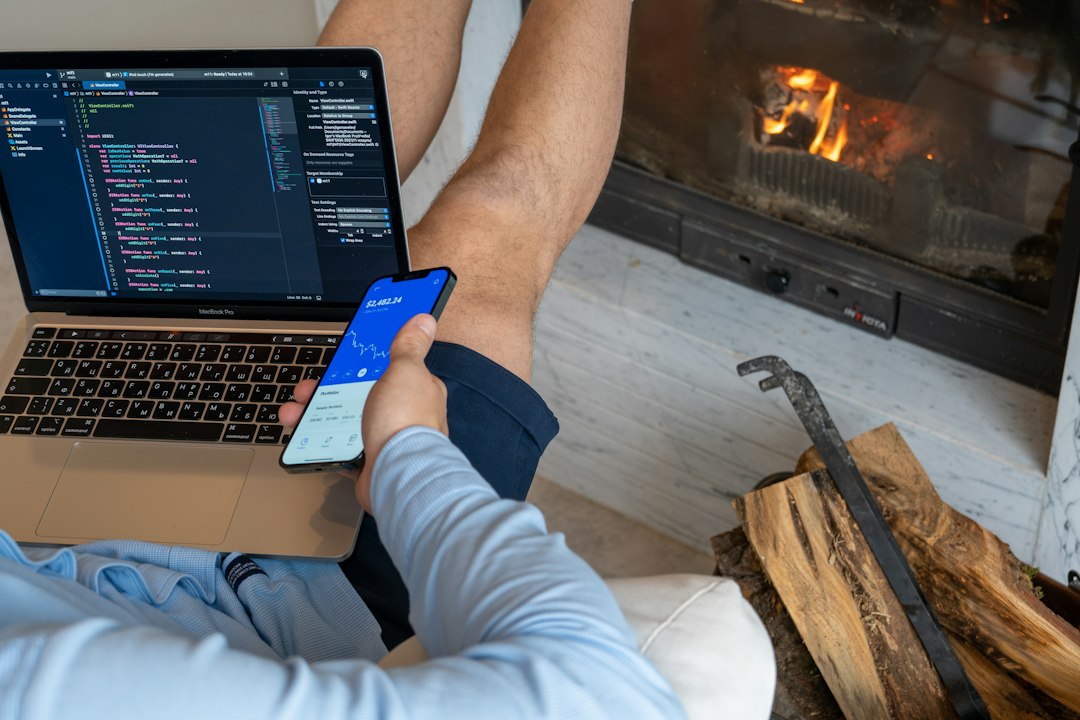 a person sitting in front of a laptop computer figma interface, code preview, developer handoff