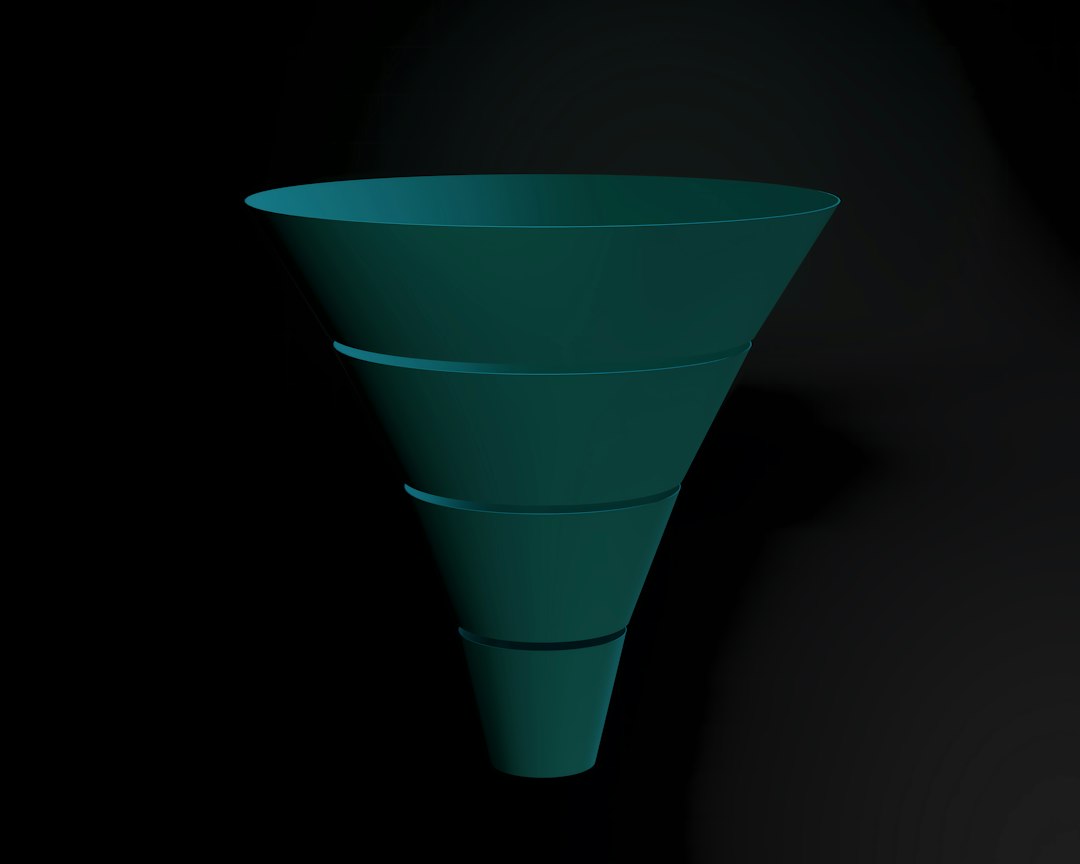 A teal funnel with four stacked segments against a black background b2b sales funnel, qualified leads, pipeline