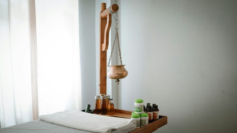 A wooden shelf with bottles and a wooden mannequin on it sensory tools, child routine, therapy room