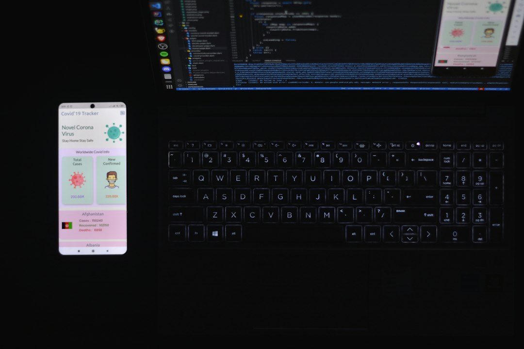 black and silver laptop computer mobile app builder, flutter interface, app development workflow