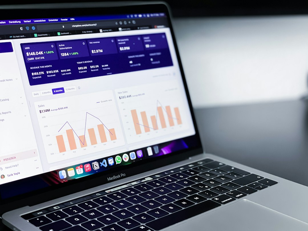 black and silver laptop computer return on ad spend, bidding strategy, marketing analytics