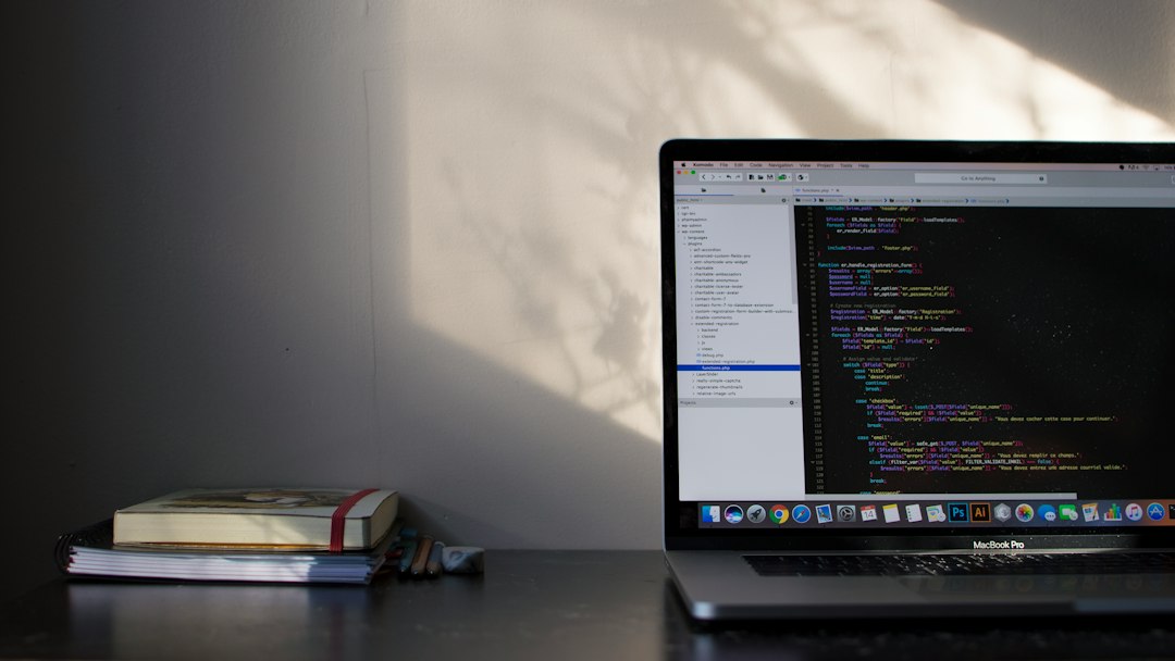 MacBook Pro showing programming language coding agent, software developer, terminal, code editor