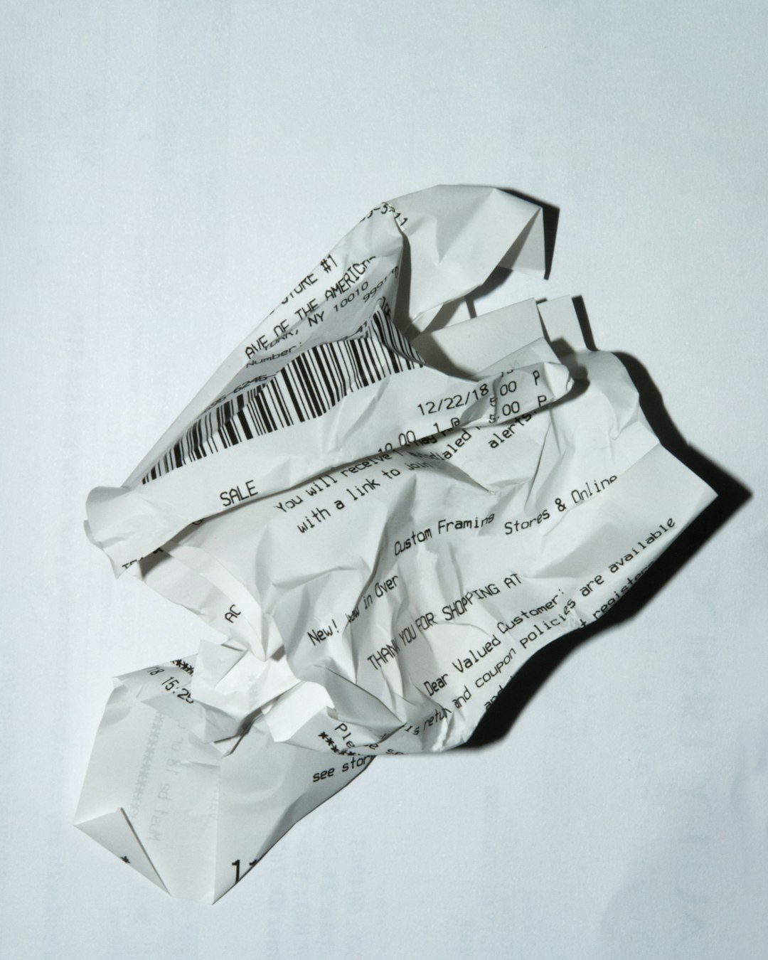 official receipt on white surface iphone document scan, paper receipt, pdf file