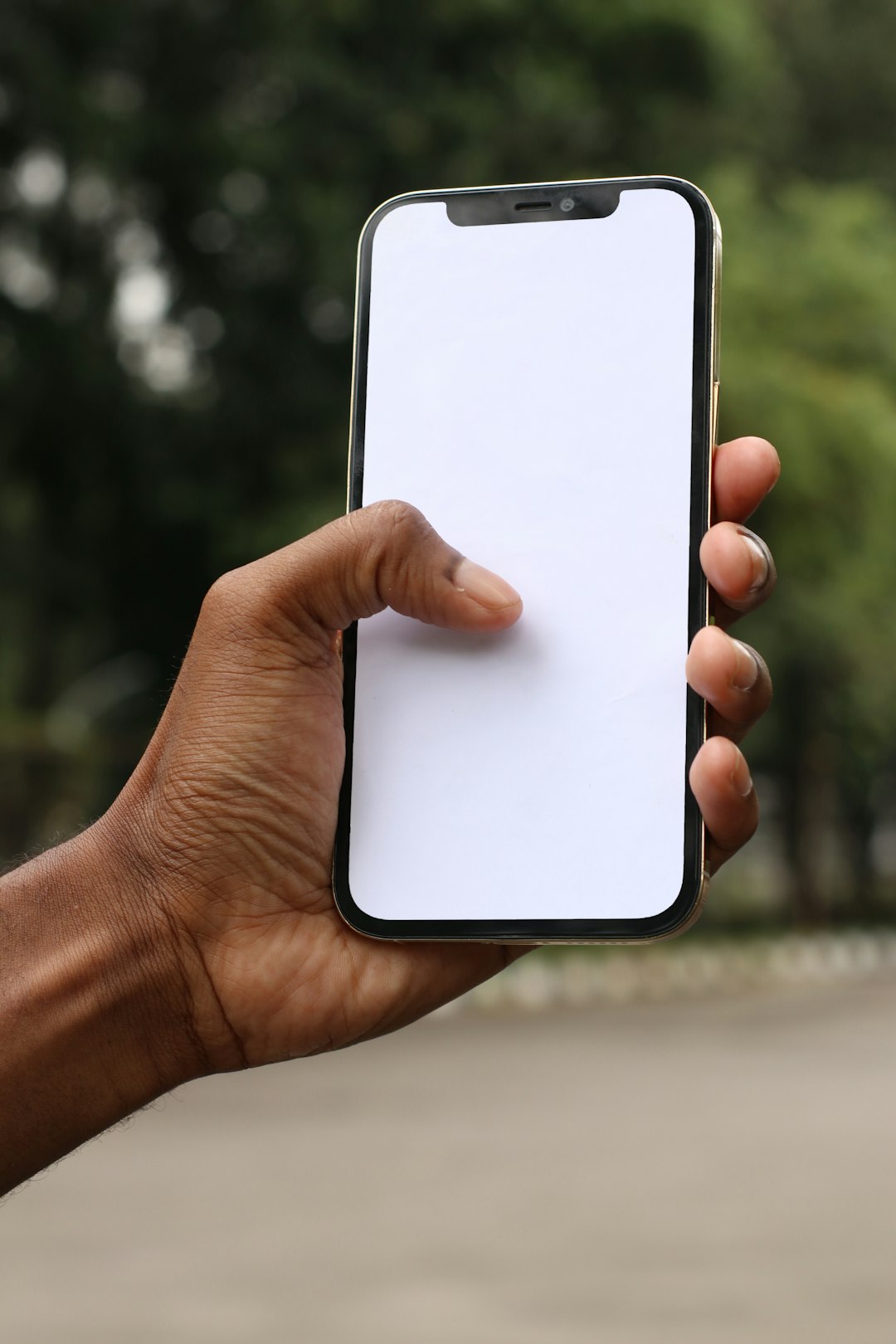 person holding white iphone 5 c iphone print preview, pinch gesture, pdf save