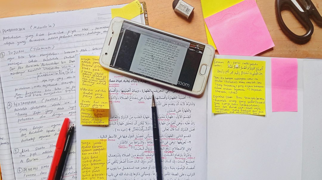 silver iphone 6 on white paper note cards, linked ideas, mobile research, digital notes