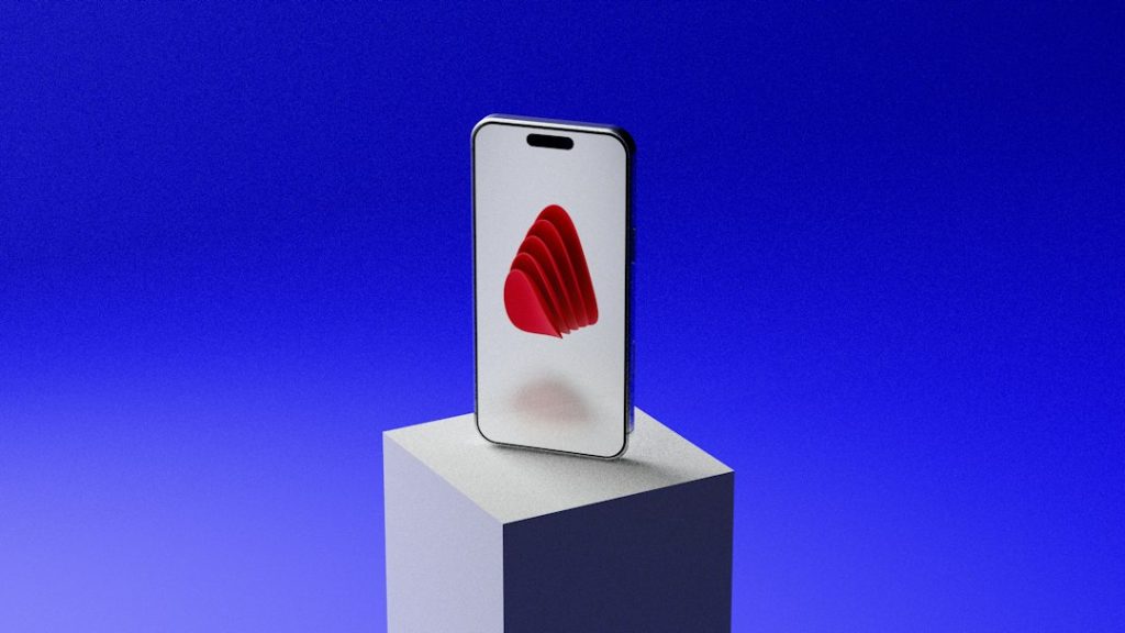 Smartphone with red abstract design on white cube, blue background brand inspired mobile wireframes design system