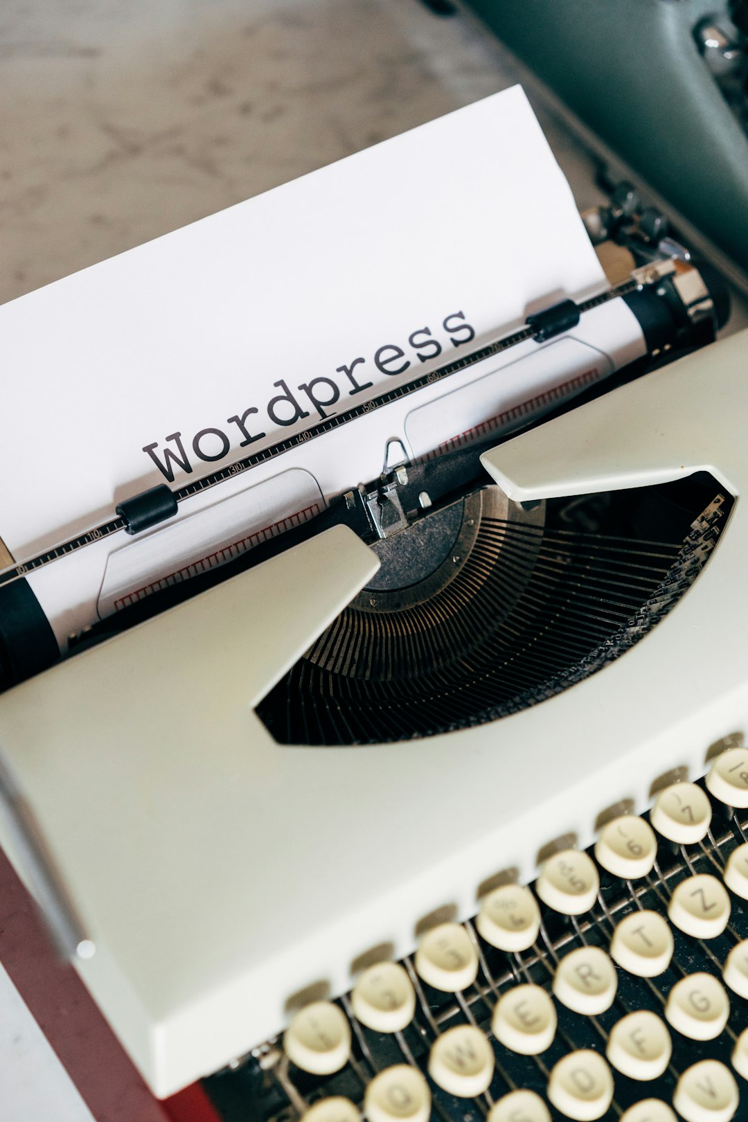 white and black typewriter on white table newsletter editor, writer desk, audience growth