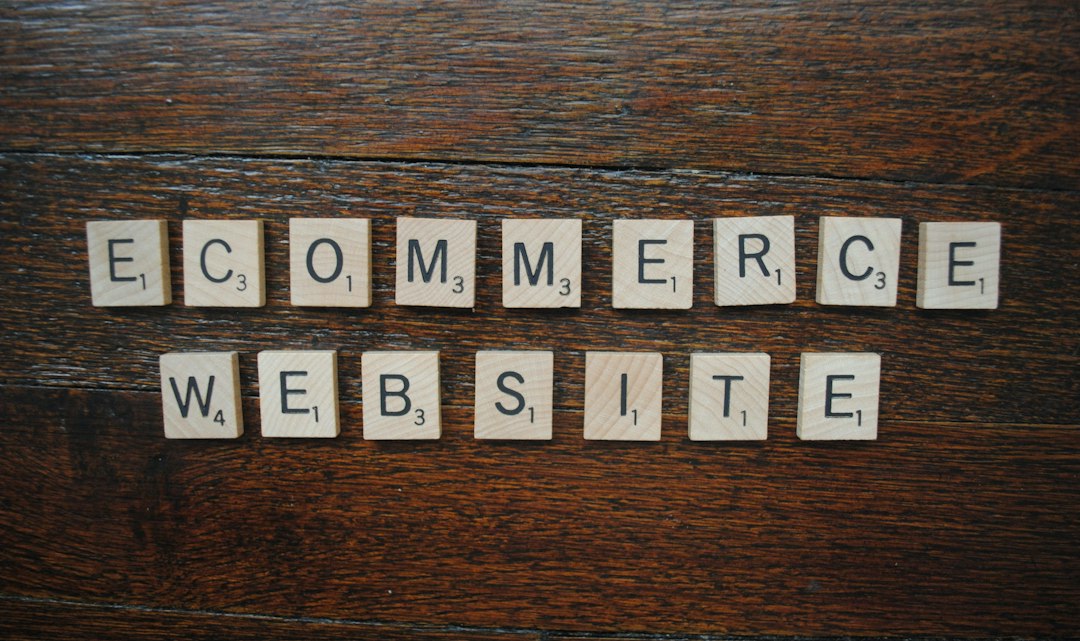 a group of white letters on a wooden surface ecommerce comparison chart, small business owner, laptop store setup