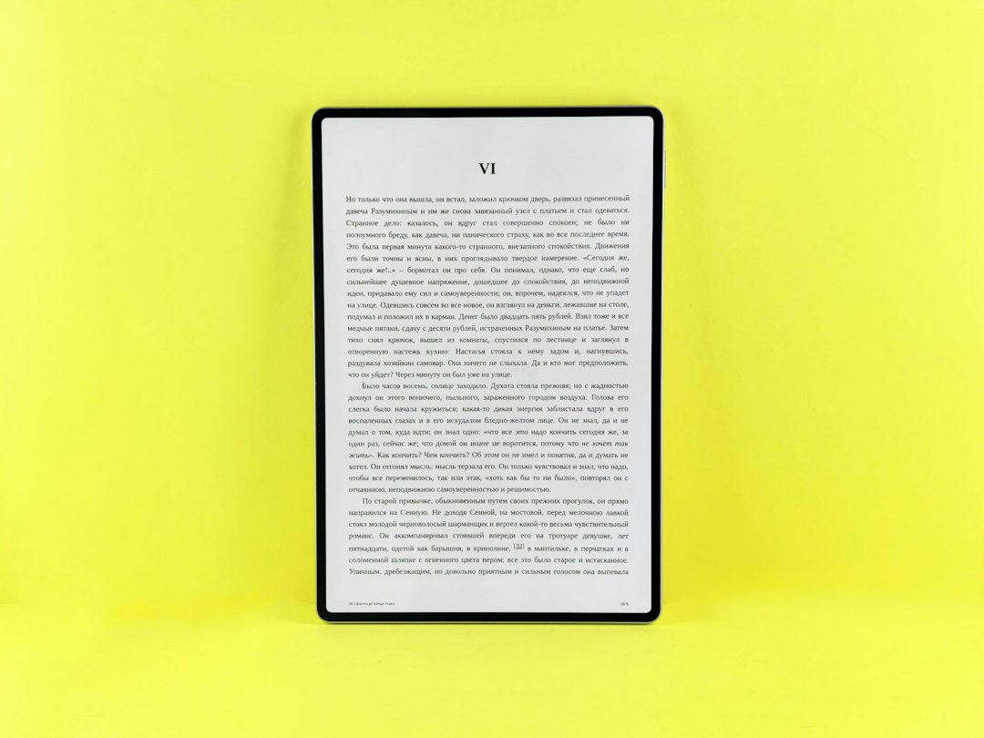 An e-reader displays text on a bright yellow background email template, subscriber list, ebook download