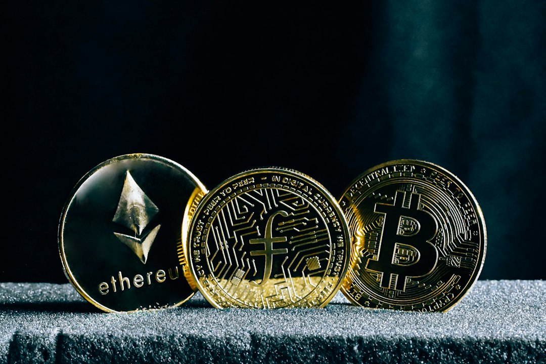 three bitcoins sitting on top of a table crypto collateral, lending pool, interest rates, wallet transaction