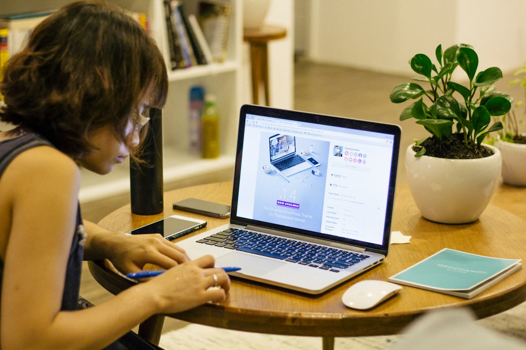 woman browsing on her laptop ecommerce comparison chart, small business owner, laptop store setup